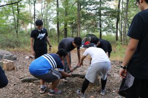 Camping Trip 2017 - <p>Boys are preparing wood for making fire.</p>